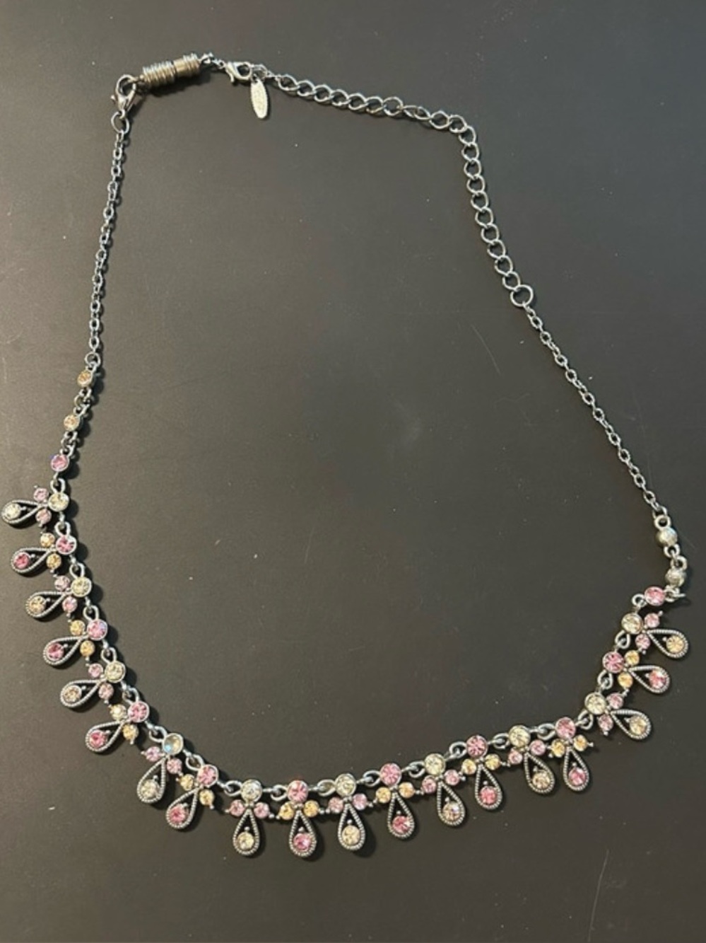 VCLM silver tone necklace with yellow and pink rhinestones